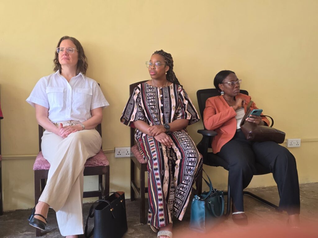Members of the visiting delegation seated during the centre visit.